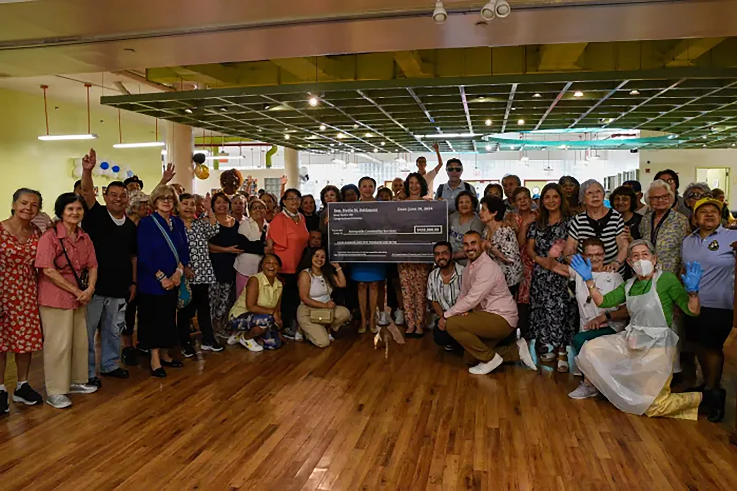 Sunnyside Post: Rep. Velázquez delivers $450,000 check to SCS for renovations